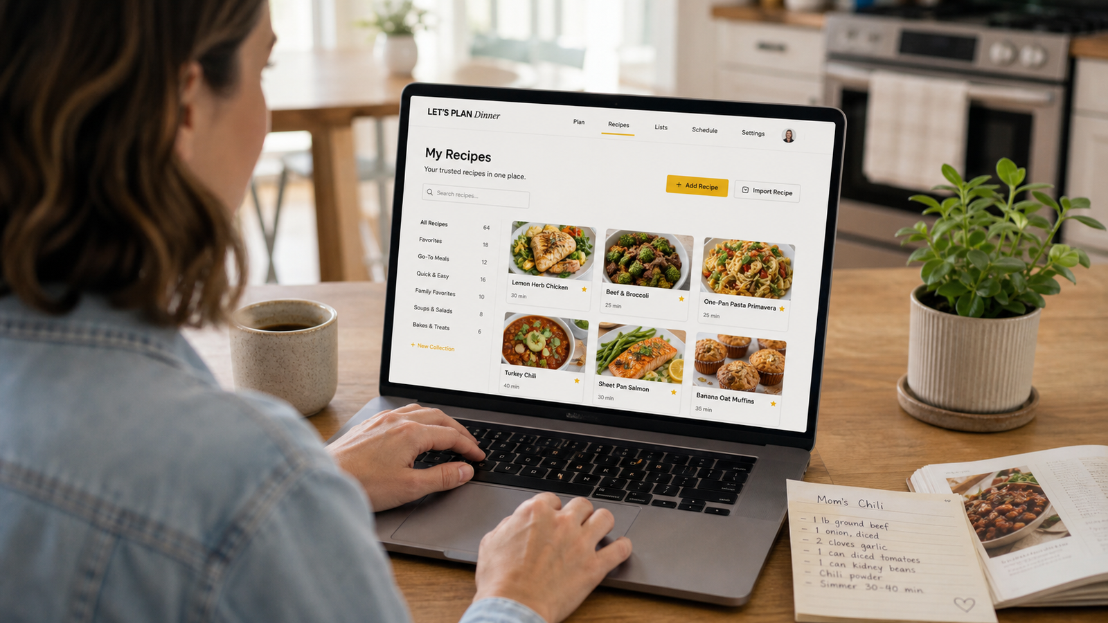 A person using the Let's Plan Dinner recipe library on a laptop beside a handwritten recipe